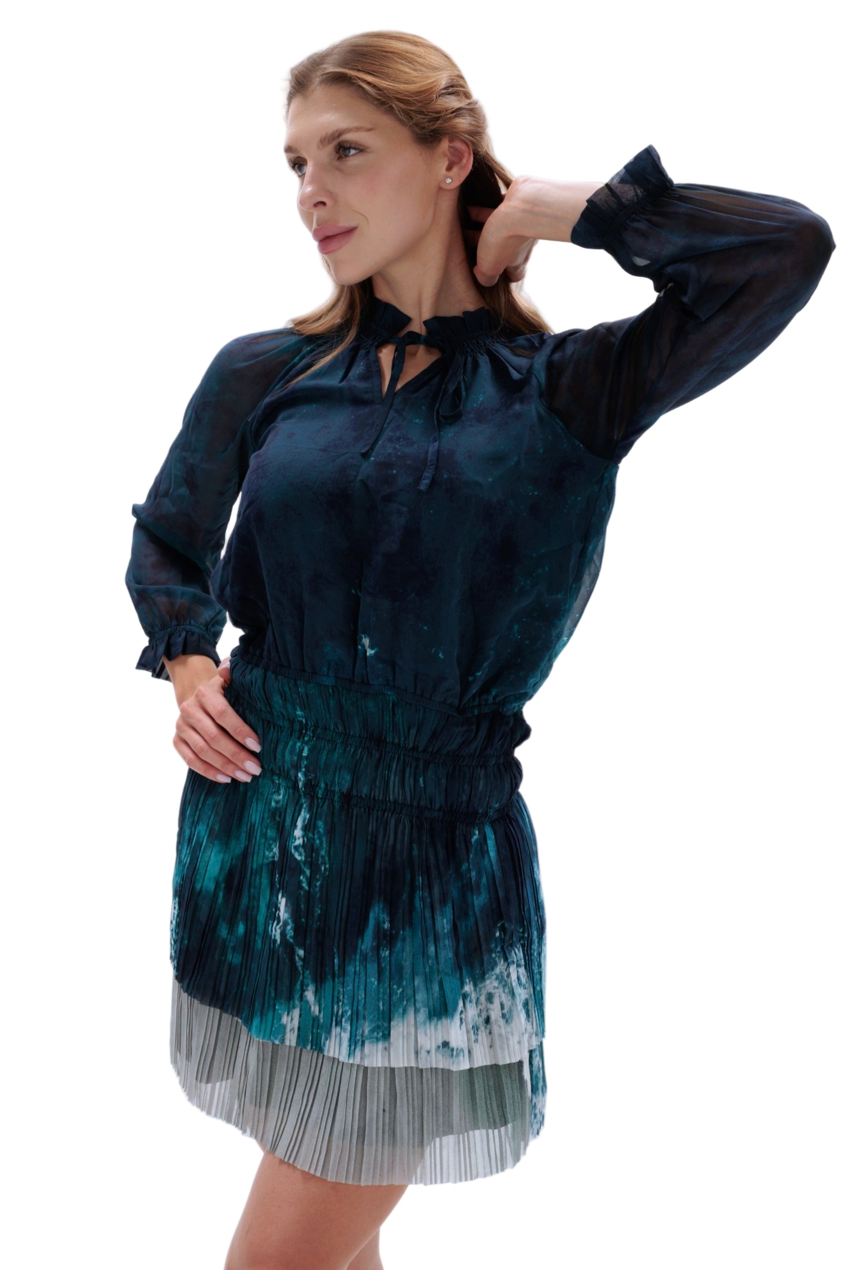 Woman wearing a dark blue dress with a white background