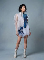 Woman wearing sustainable Shoredarling Sheer Panel Avantgarde Button-Up Tunic fashion